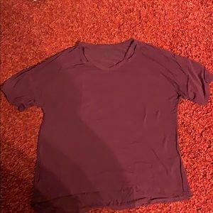 a maroon shirt